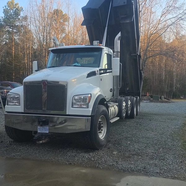 Tri-axle dump truck loaded and ready to haul