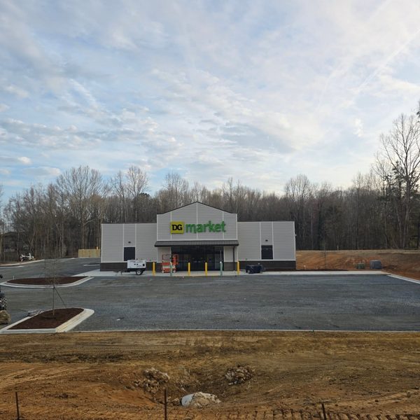 Finished retail store with its graded lot and parking area complete