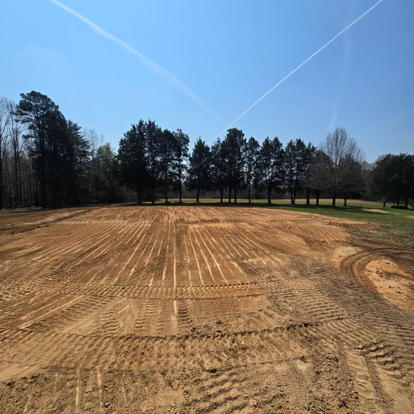 Wide graded field tracked flat by dozer