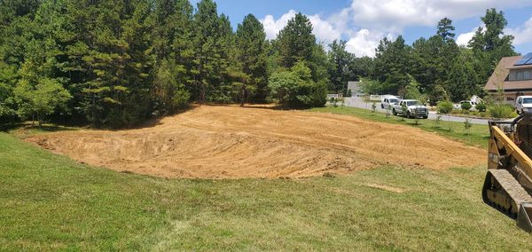 Excavated pond basin shaped and ready to hold water