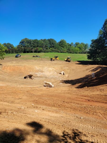 Wide pond basin excavated down to clay